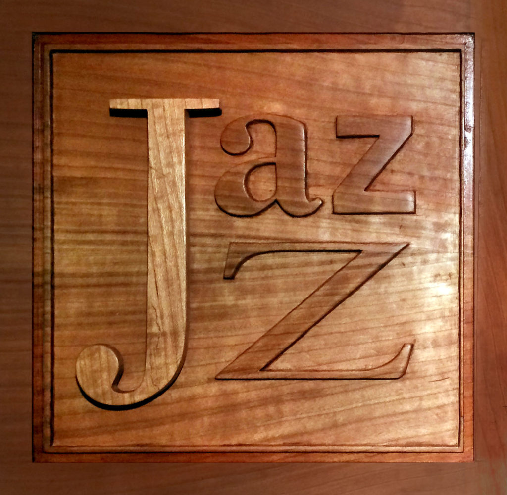 Jazz logo cut out of wood