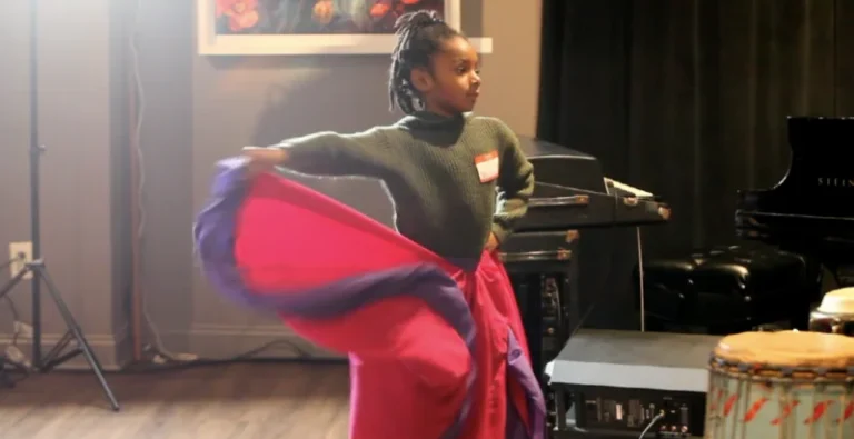 A child dancing during a Jitterbugs class.